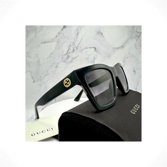 Gucci GG1714S 001 unisex black oversized square sunglasses with gold GG logo