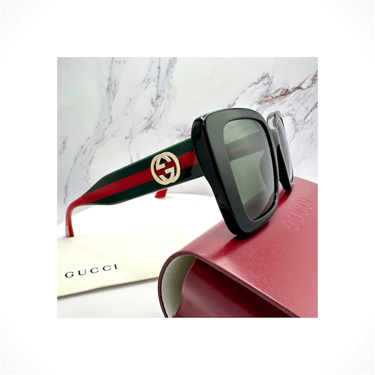 Gucci GG1861S 001 women's black oversized square sunglasses with web temples