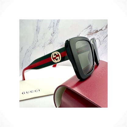 Gucci GG1861S 001 women's black oversized square sunglasses with web temples