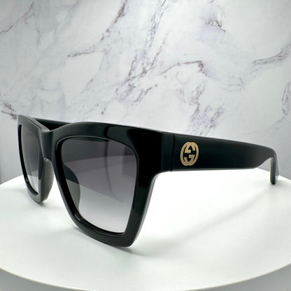 Gucci GG1714S 001 black square sunglasses with grey gradient lens and gold interlocking GG logo side view