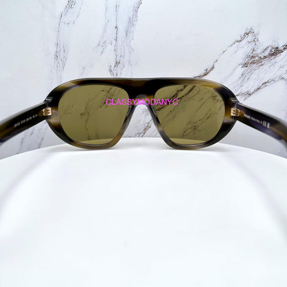 Prada PRC05S 23G70G aviator sunglasses with green lens