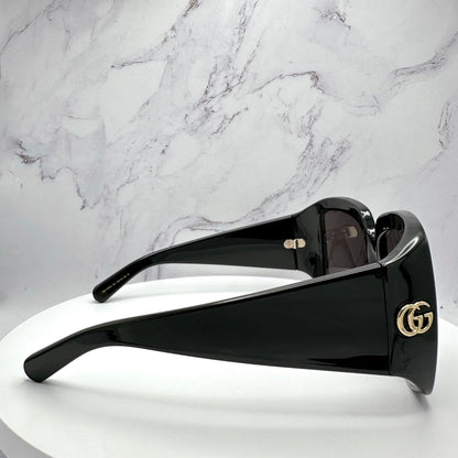 Gucci GG1402S 001 black square wrap grey lens gold logo sunglasses side view with temple arms