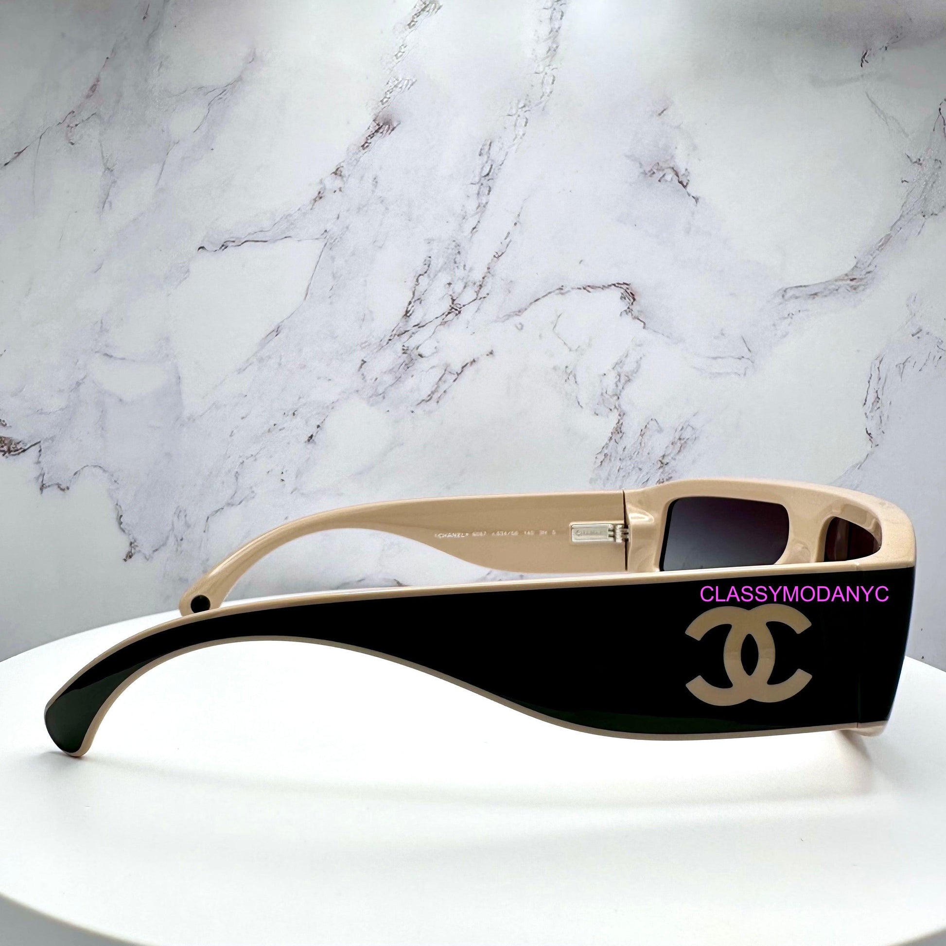 Chanel CH6057 C534/S6 black shield sunglasses with beige CC logo side view