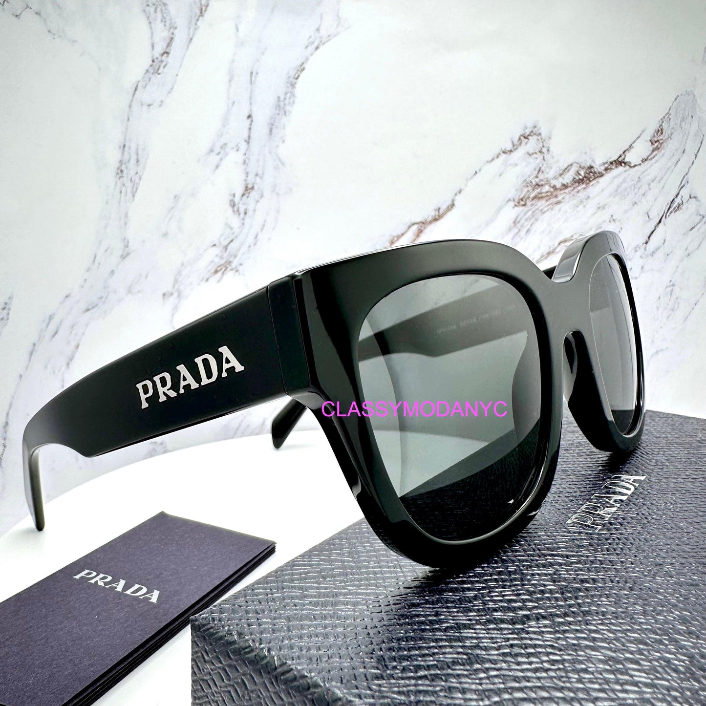 Prada PRC04S 16K08Z black square silver letter logo sunglasses side view