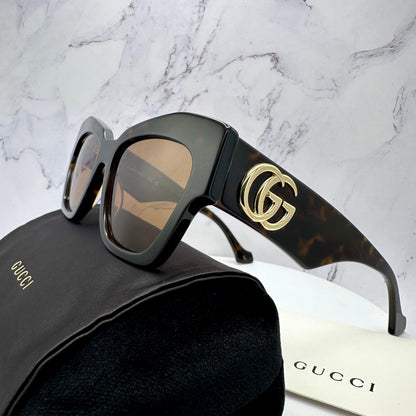 Gucci GG1422S 003 brown tortoise gold metal cat eye sunglasses side view with case
