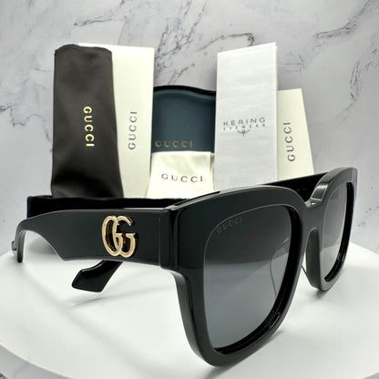 Gucci GG0998S 001 black oversized acetate temple arm sunglasses with gold metal GG logo