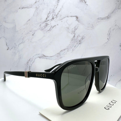 Gucci GG1494S 001 black aviator mens sunglasses with gold letter logo angle view