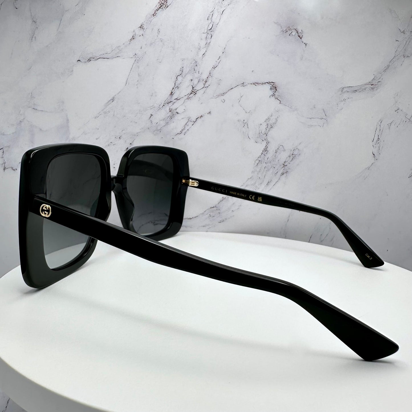 Gucci Black Gold Sunglasses GG Logo GG1314S 001