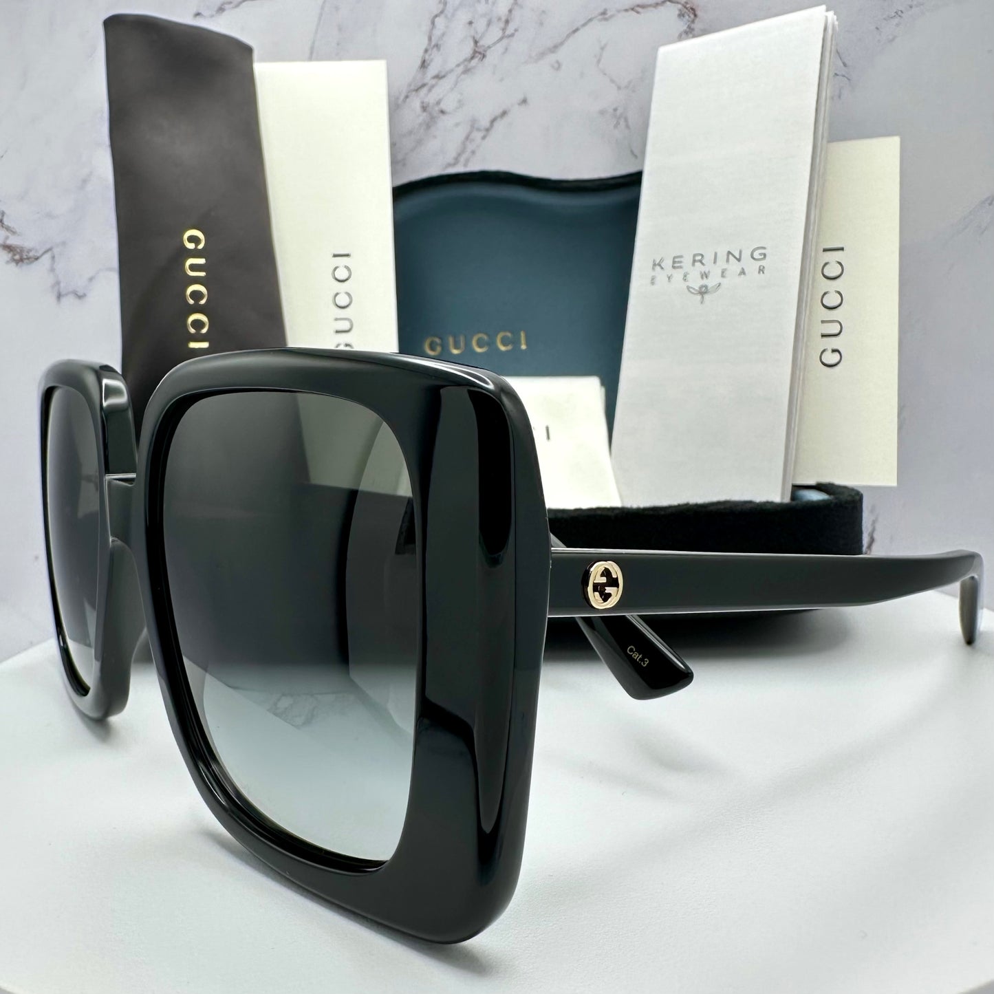 Gucci Black Gold Sunglasses GG Logo GG1314S 001