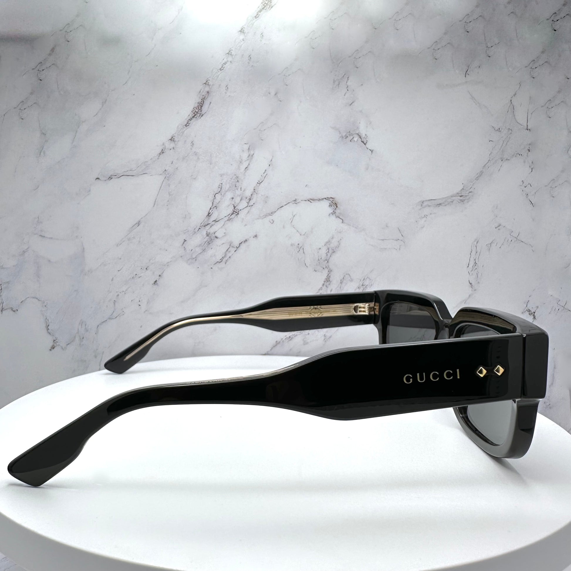 Gucci GG1218S 001 Sunglasses Black Gold Logo