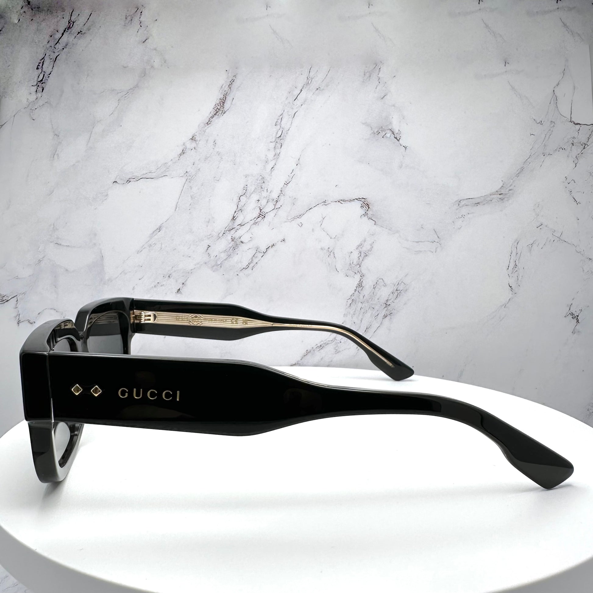 Gucci GG1218S 001 Sunglasses Black Gold Logo