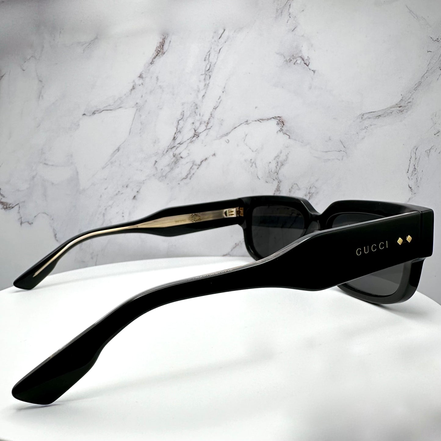 Gucci GG1218S 001 Sunglasses Black Gold Logo