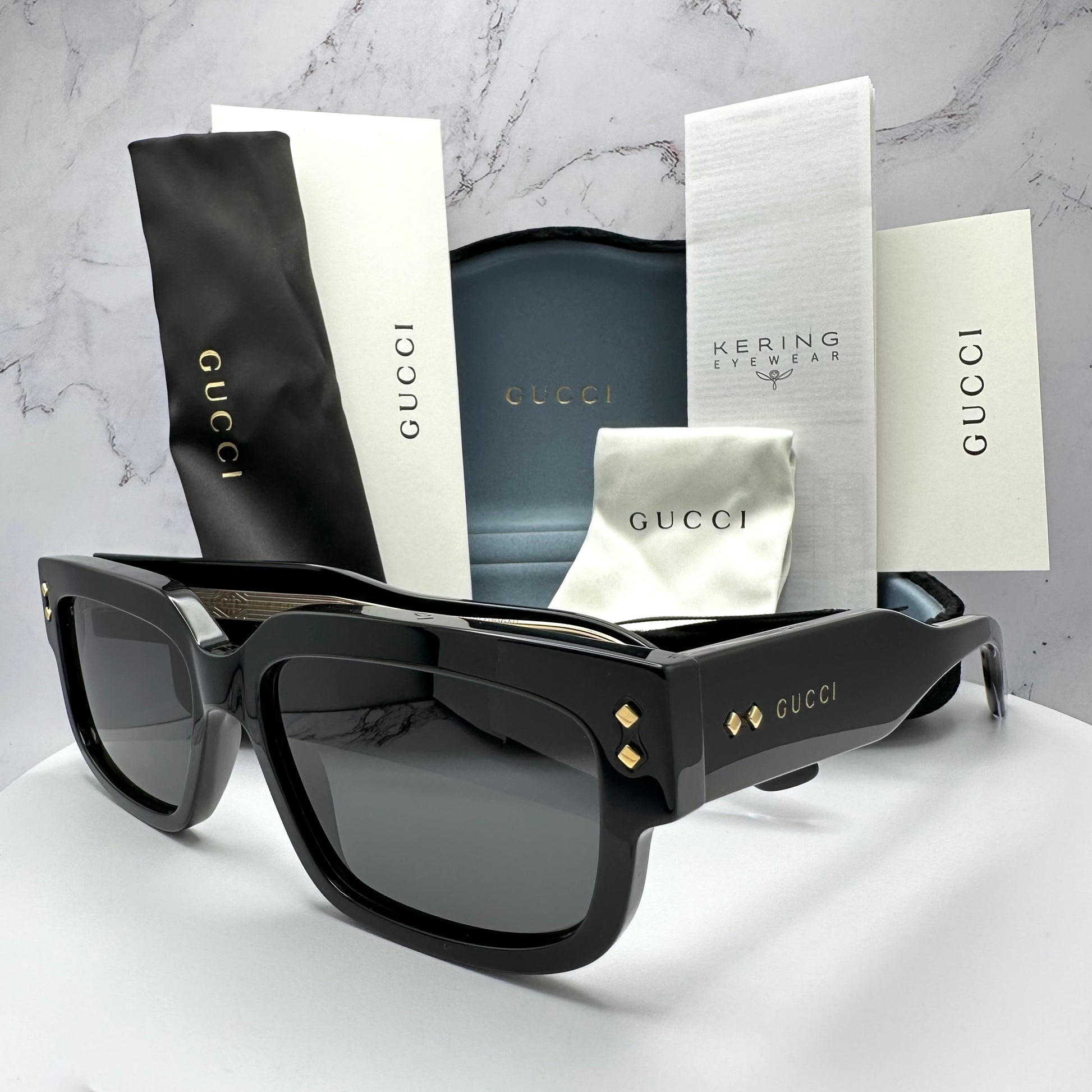 Gucci GG1218S 001 Sunglasses Black Gold Logo