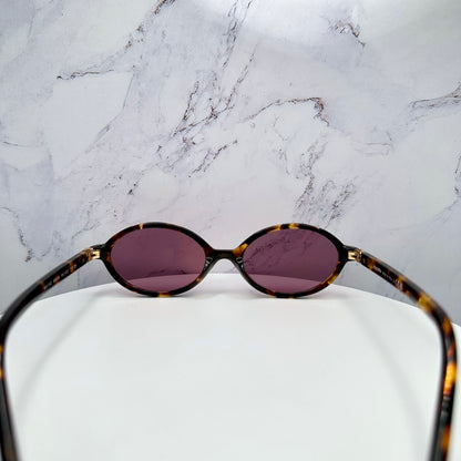 MIU MIU 0MU04ZS VAU50D