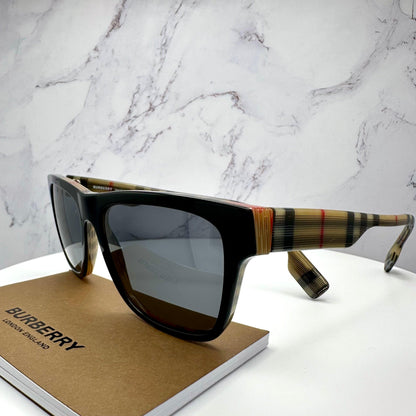 Burberry 0BE4293 3806/87 black sunglasses with grey lens check arms.