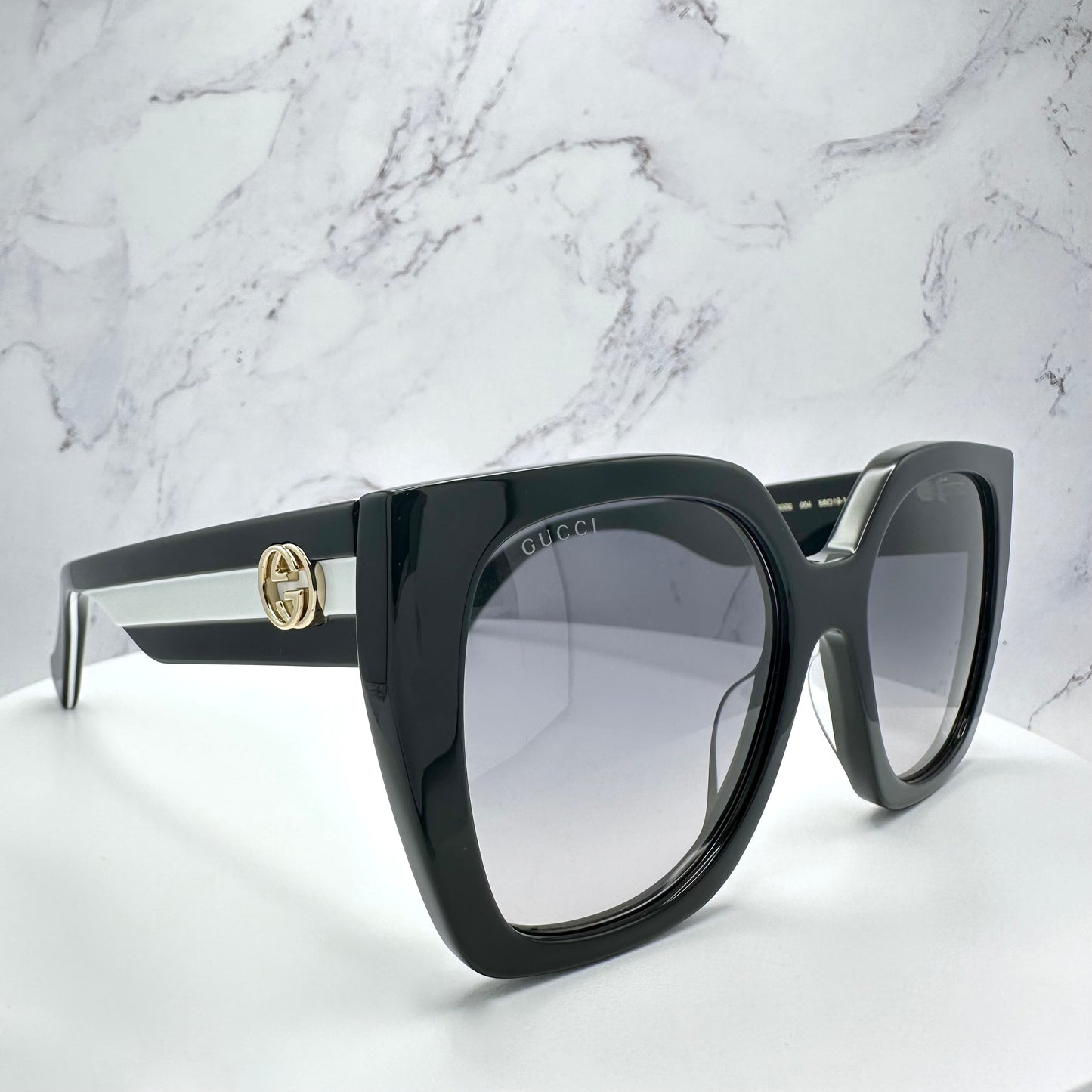 Gucci Sunglasses GG1300S 004 Black White Gold GG Logo