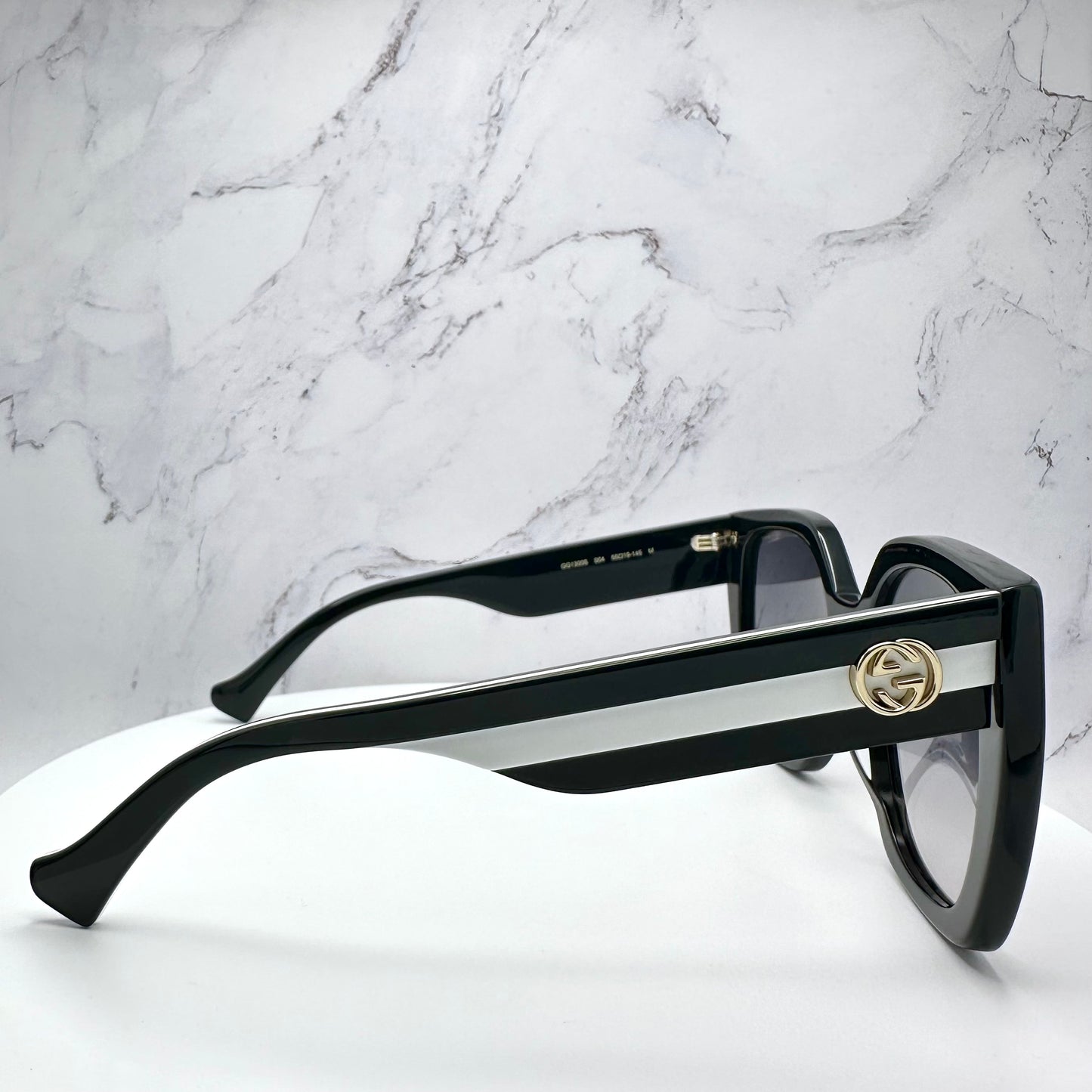 Gucci Sunglasses GG1300S 004 Black White Gold GG Logo