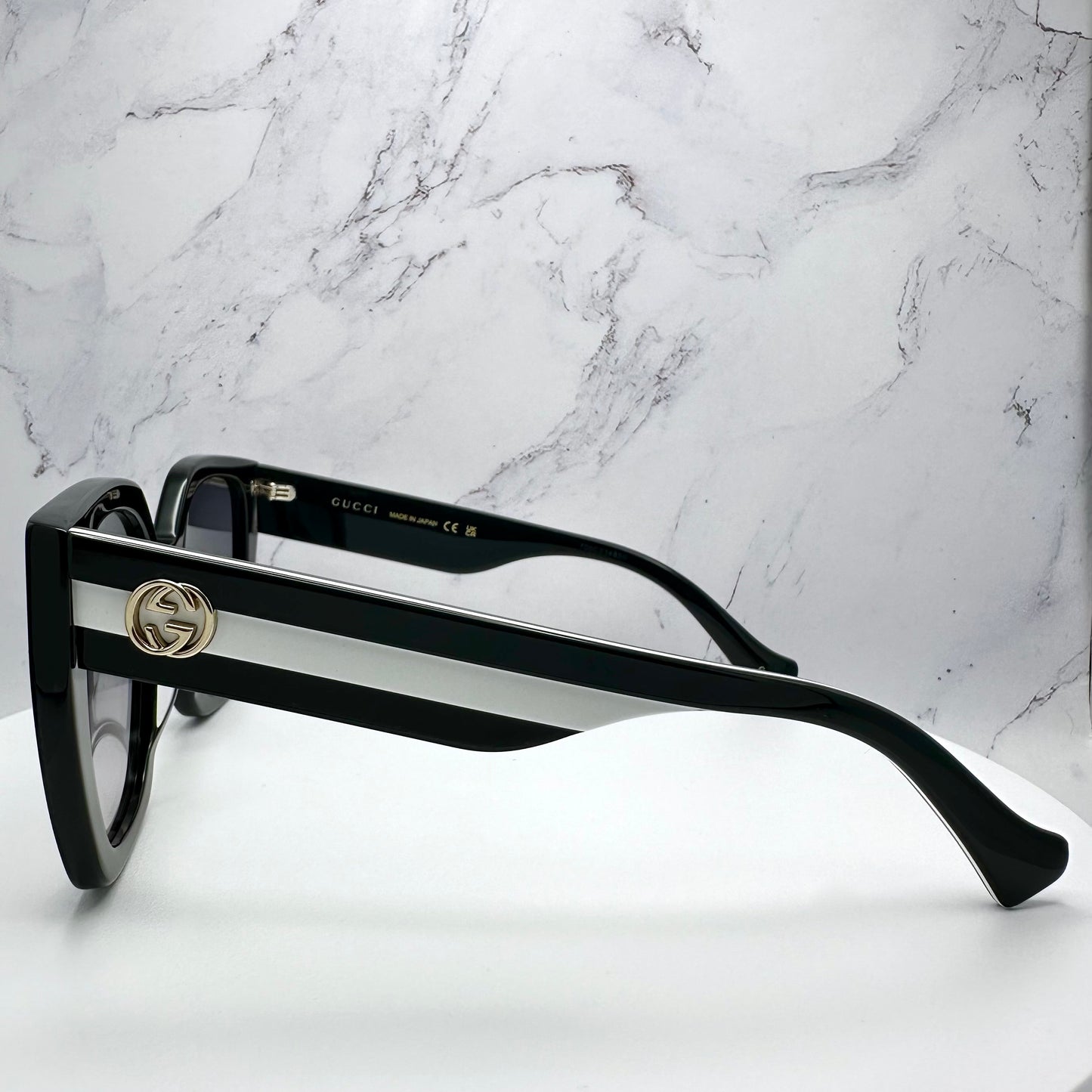 Gucci Sunglasses GG1300S 004 Black White Gold GG Logo