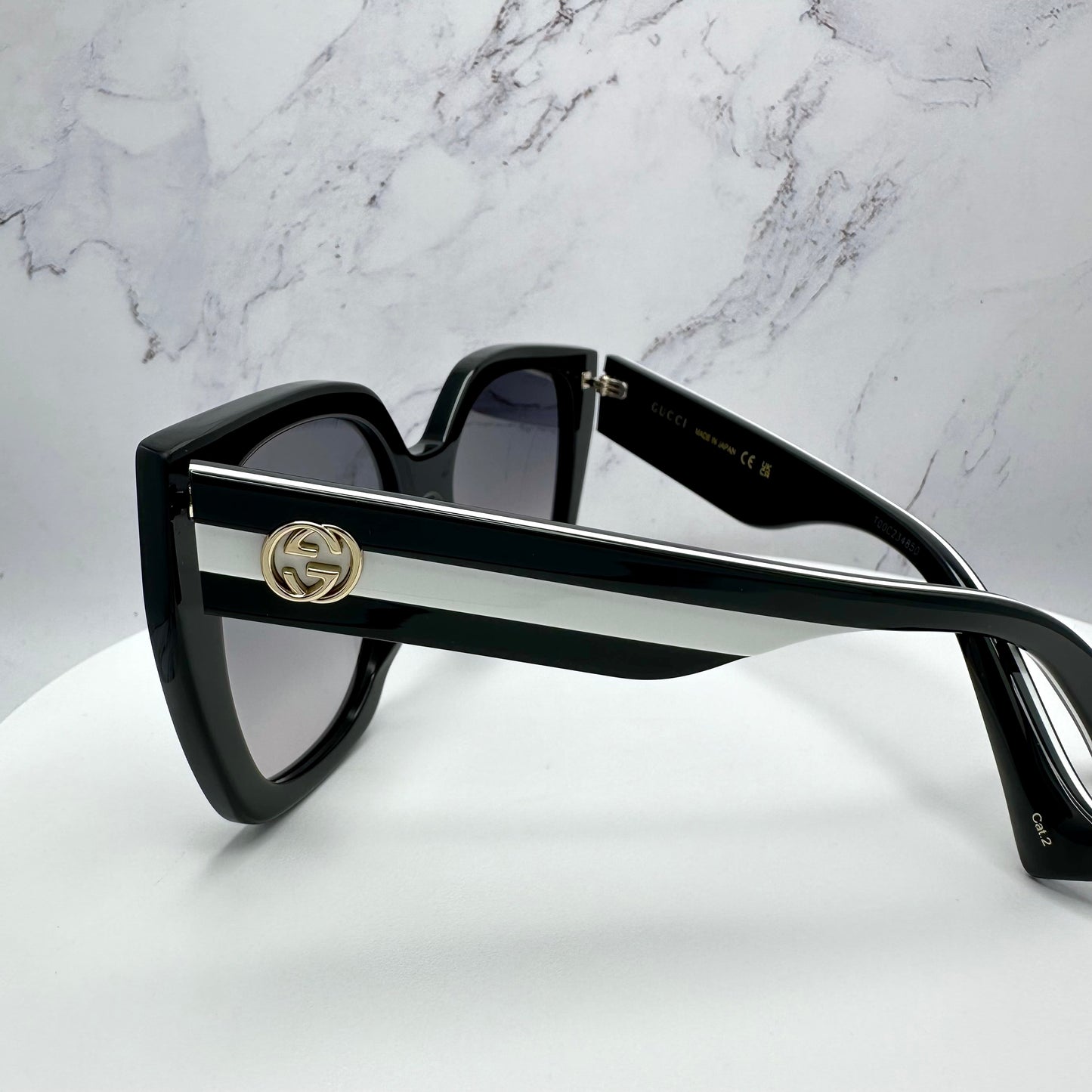 Gucci Sunglasses GG1300S 004 Black White Gold GG Logo