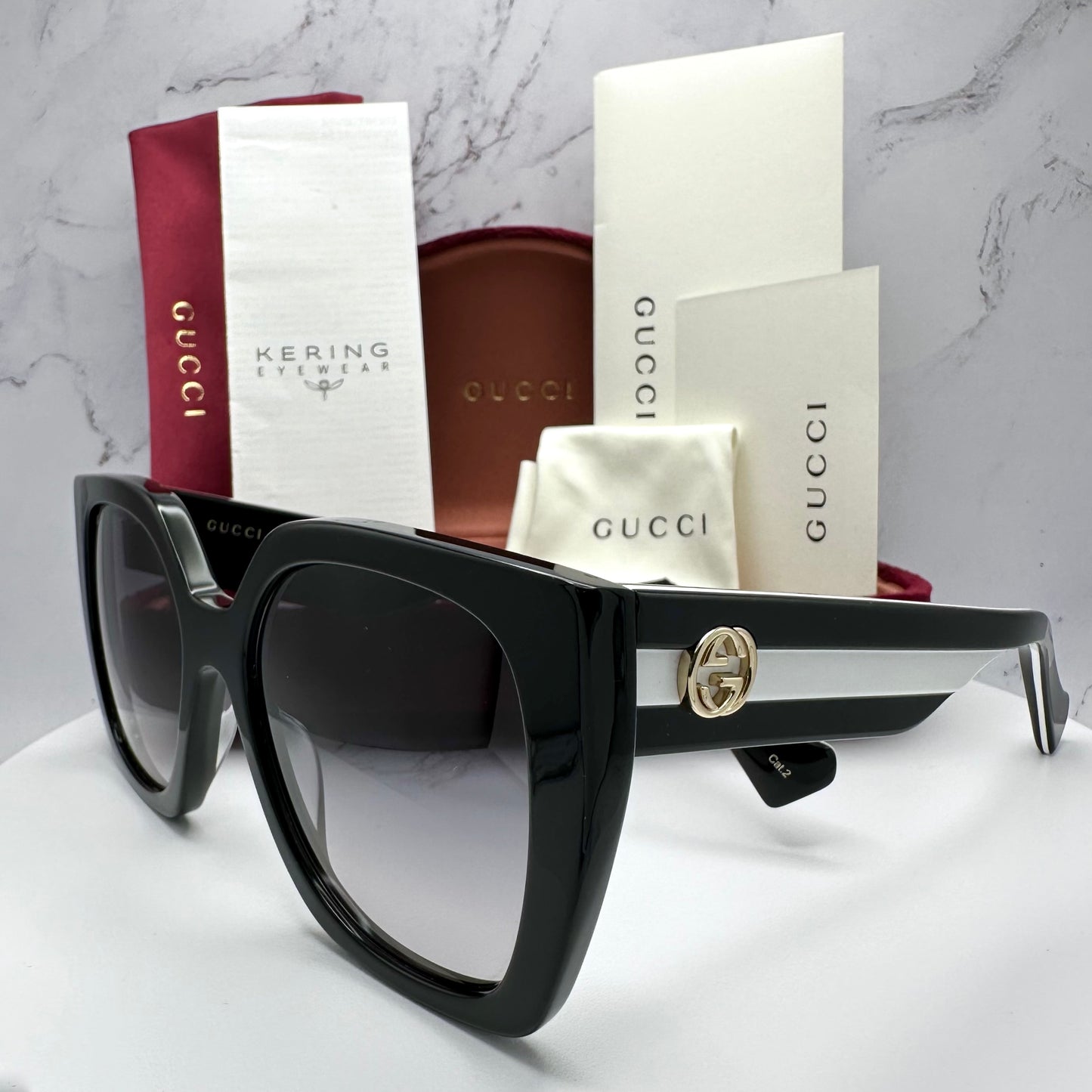 Gucci Sunglasses GG1300S 004 Black White Gold GG Logo