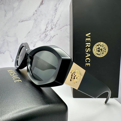 VERSACE VE4466U GB1/87 black oval women's sunglasses with medusa logo side view.