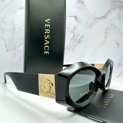 VERSACE VE4466U GB1/87 black oval women's sunglasses with medusa logo.