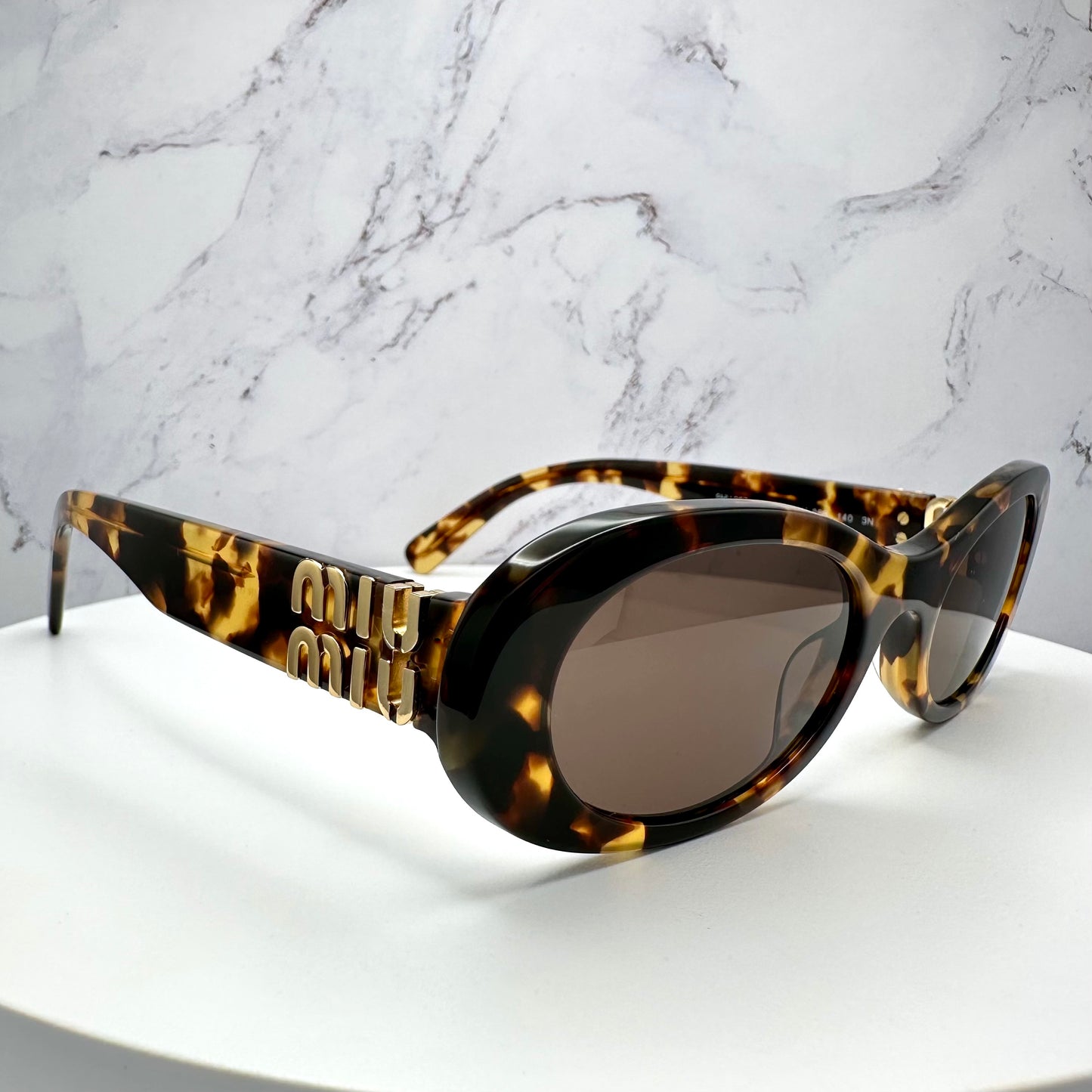 MIU MIU Sunglasses Brown Gold Oval MU06ZS VAU-06B