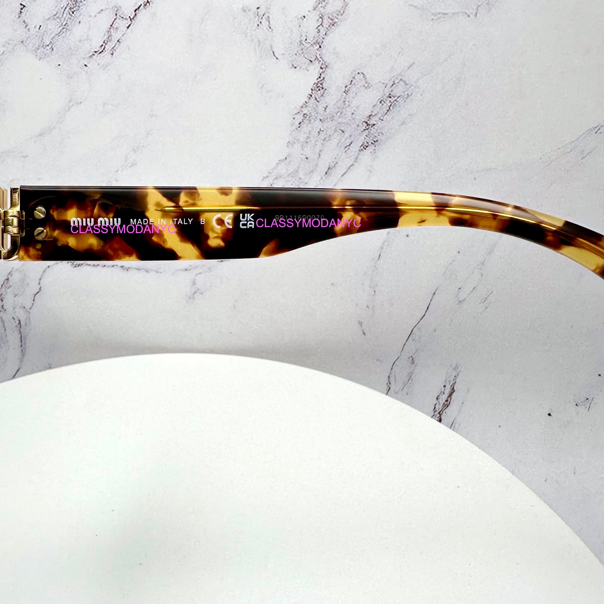 MU 06ZS VAU06B Miu Miu Sunglasses UPC 8056597989077