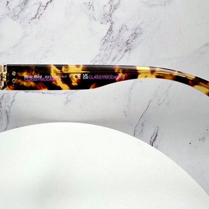 MU 06ZS VAU06B Miu Miu Sunglasses UPC 8056597989077