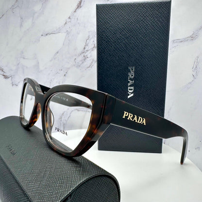 Prada PR A16V 17N1O1 brown tortoise cat eye glasses gold metal logo side view demo lens.