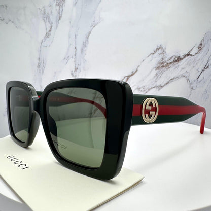 GUCCI GG1861S 005 black square sunglasses with red and green striped arms side view for women