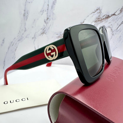 GUCCI GG1861S 005 black polarized square sunglasses with red and green striped arms side view for women with case