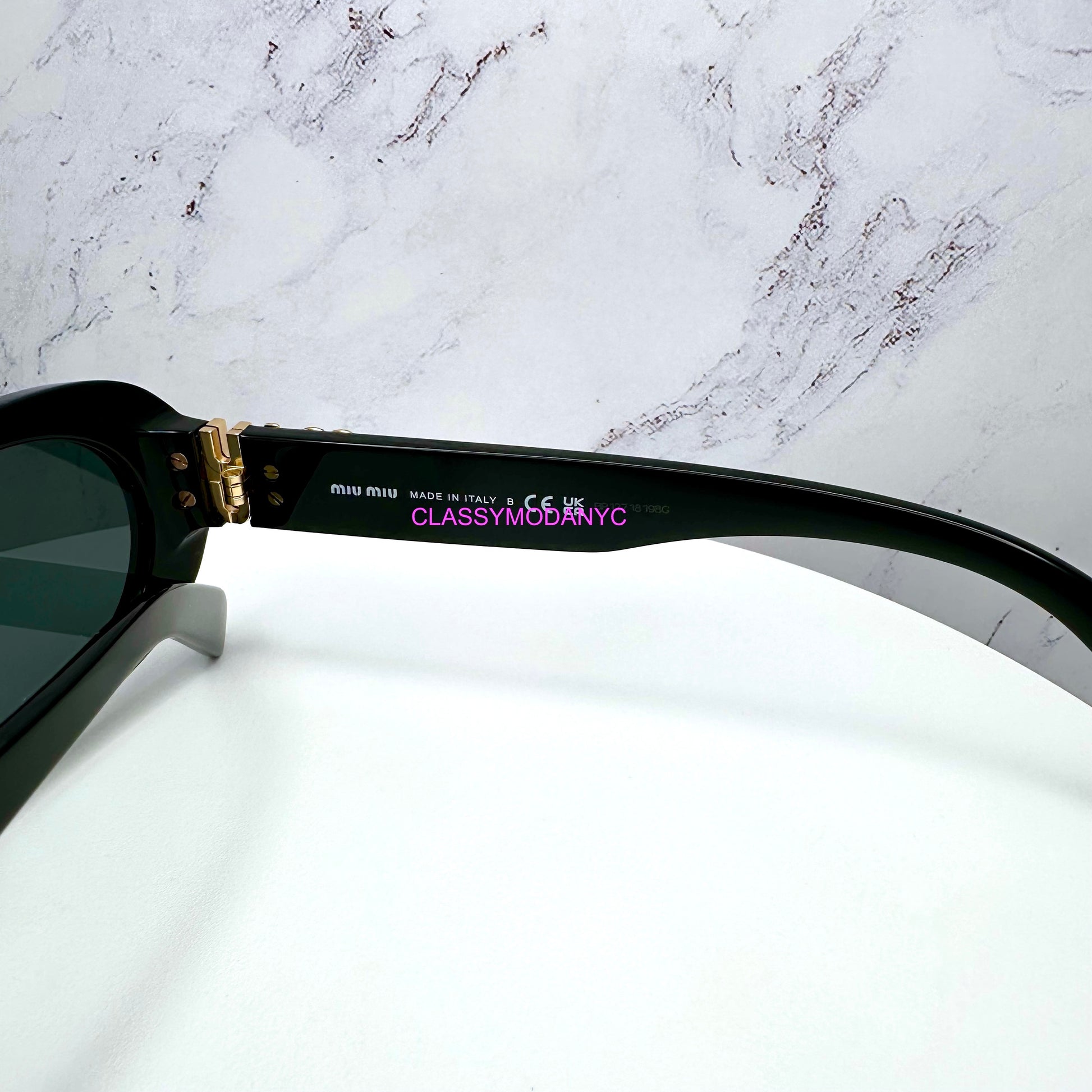 MU 06ZS 1AB5S0 Miu Miu Sunglasses 8056597989060