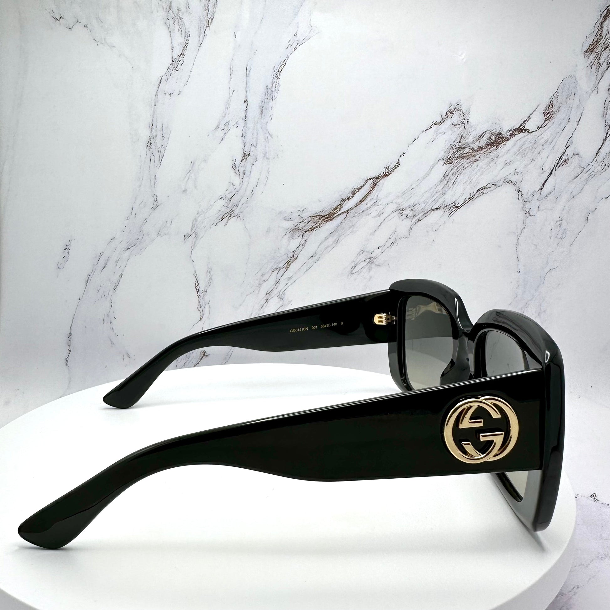 GG0141SN 001 Gucci Sunglasses Black Gold GG Logo 