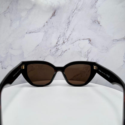 PRADA PRA09S 16N5Y1 brown cat eye sunglasses with gold metal logo on temple arm back view