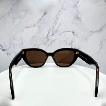 PRADA 0PRA09S 16N5Y1 brown cat eye sunglasses with gold metal logo on temple arm back view.