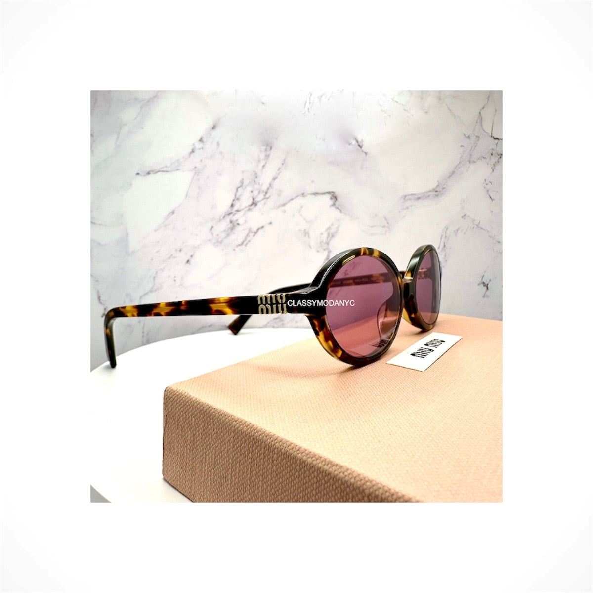 MIU MIU MU 04ZS VAU50D women's brown honey Havana tortoise acetate round sunglasses with pink mirror lenses and gold logo