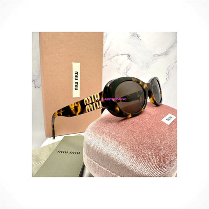 MIU MIU MU 06ZS VAU06B women's brown tortoise oval acetate sunglasses with brown lenses and gold MIU MIU logo