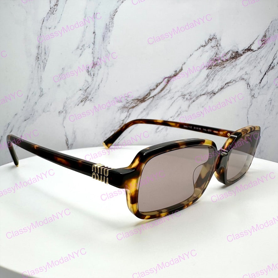 MIU MIU U11ZS 14L20I MIU MIU sunglasses 
