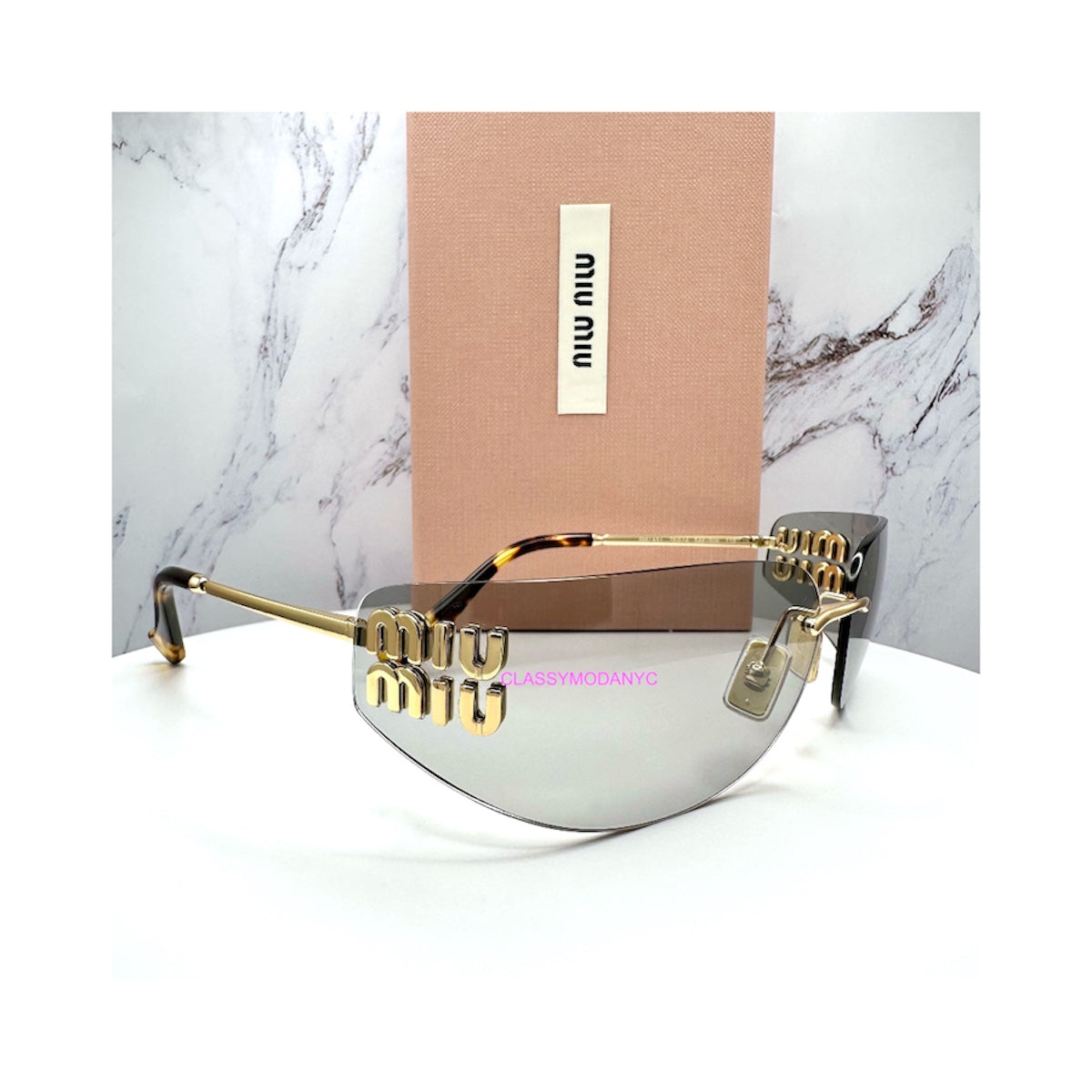 MUA51S 5AK50K MIU MIU wrap sunglasses gold light grey 
