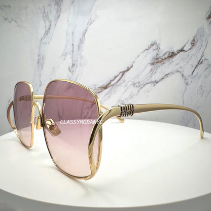 MIU MIU MUA57S 5AK40S gold oversized sunglasses with gradient pink brown lens side view