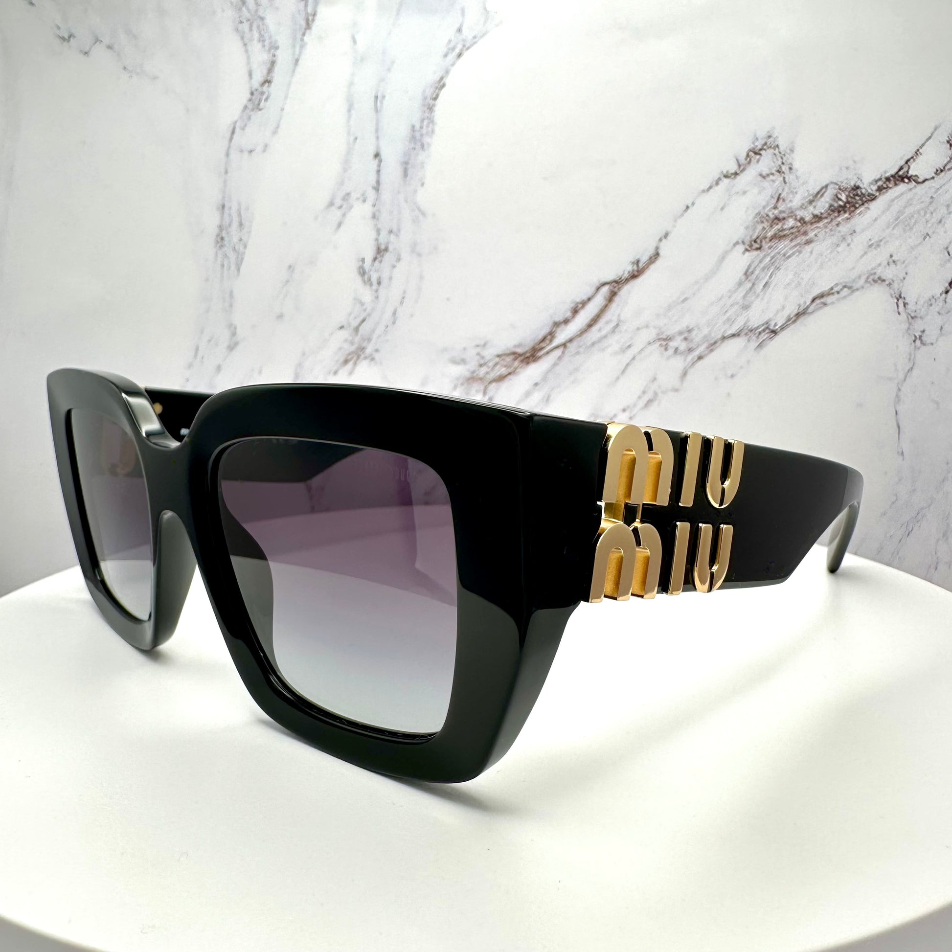 Miu Miu black square oversized sunglasses with gold logo MUB05S 16K90A 