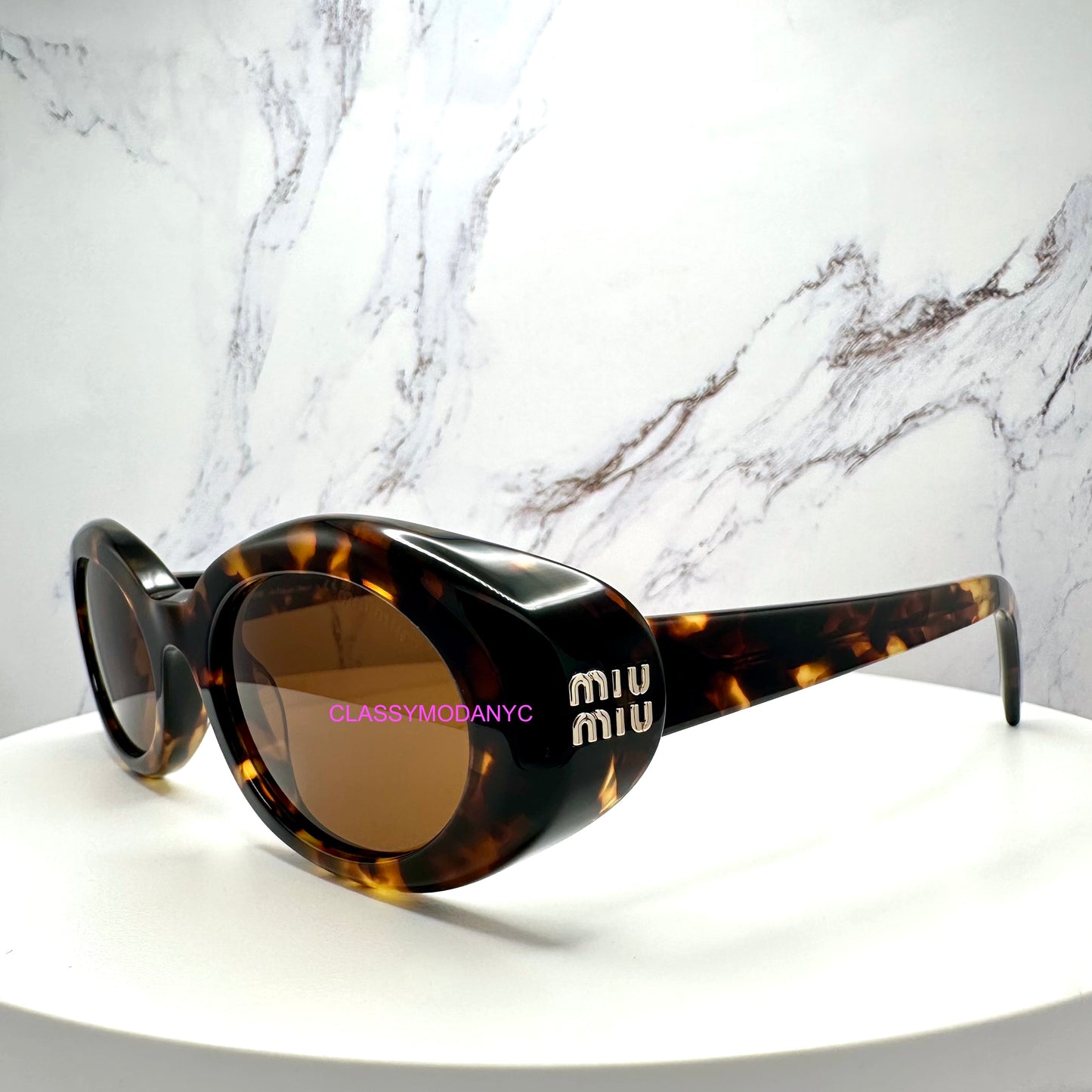 MUB09S 14L20V MIU MIU brown tortoise sunglasses side view 