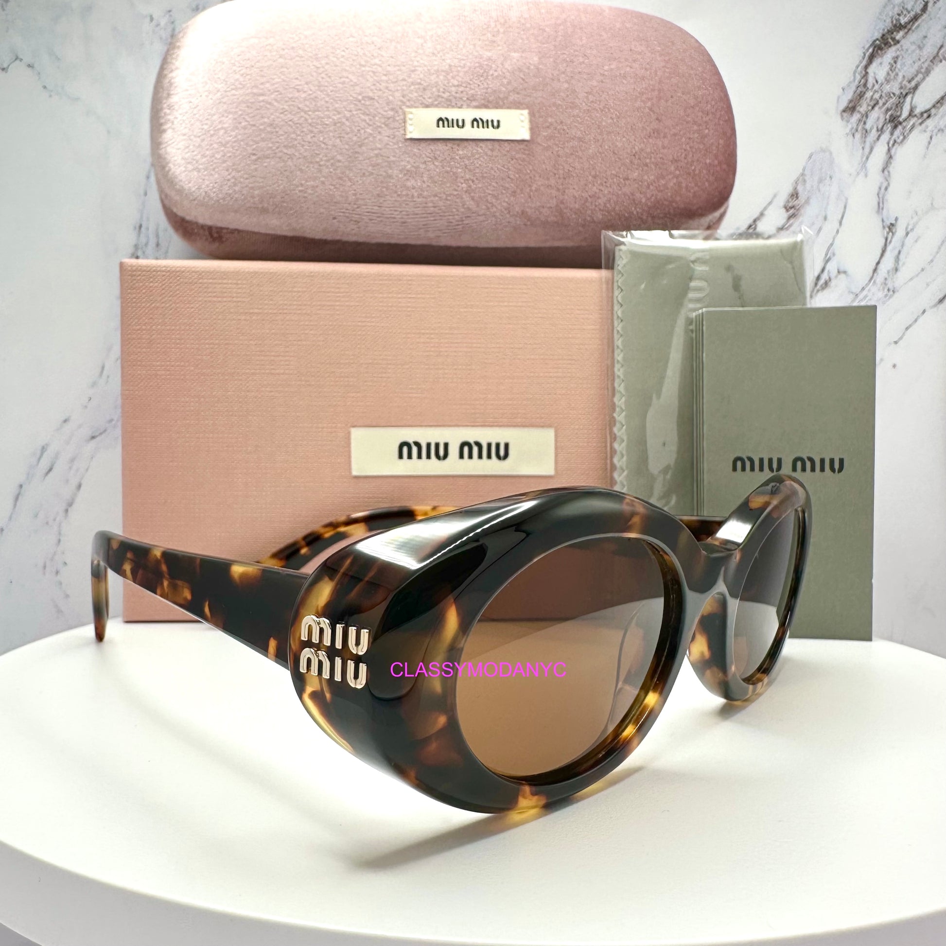 MUB09S 14L20V MIU MIU brown tortoise womens sunglasses angle view 