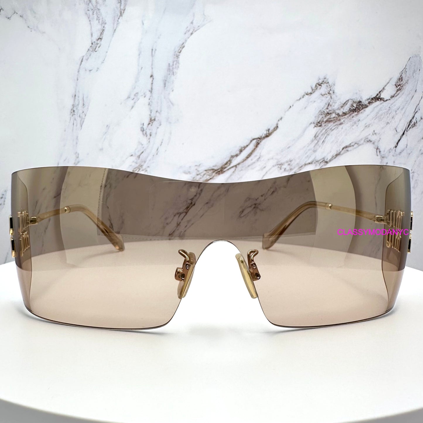 MUB53S 5AK20P MIU MIU sunglasses front view 