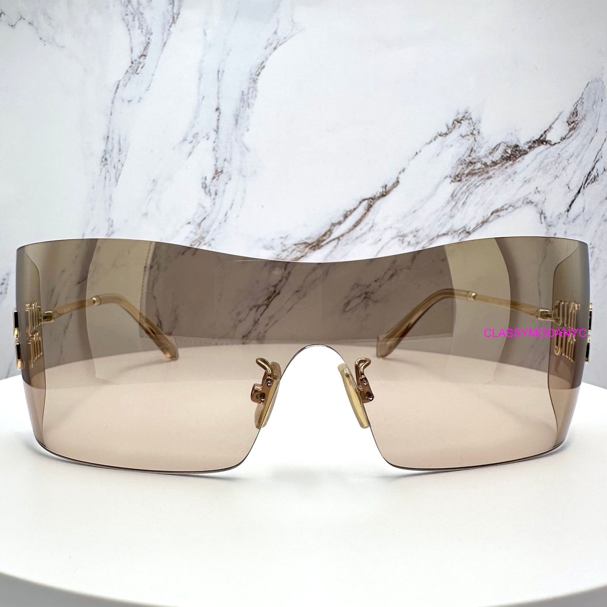 MUB53S 5AK20P MIU MIU sunglasses front view 