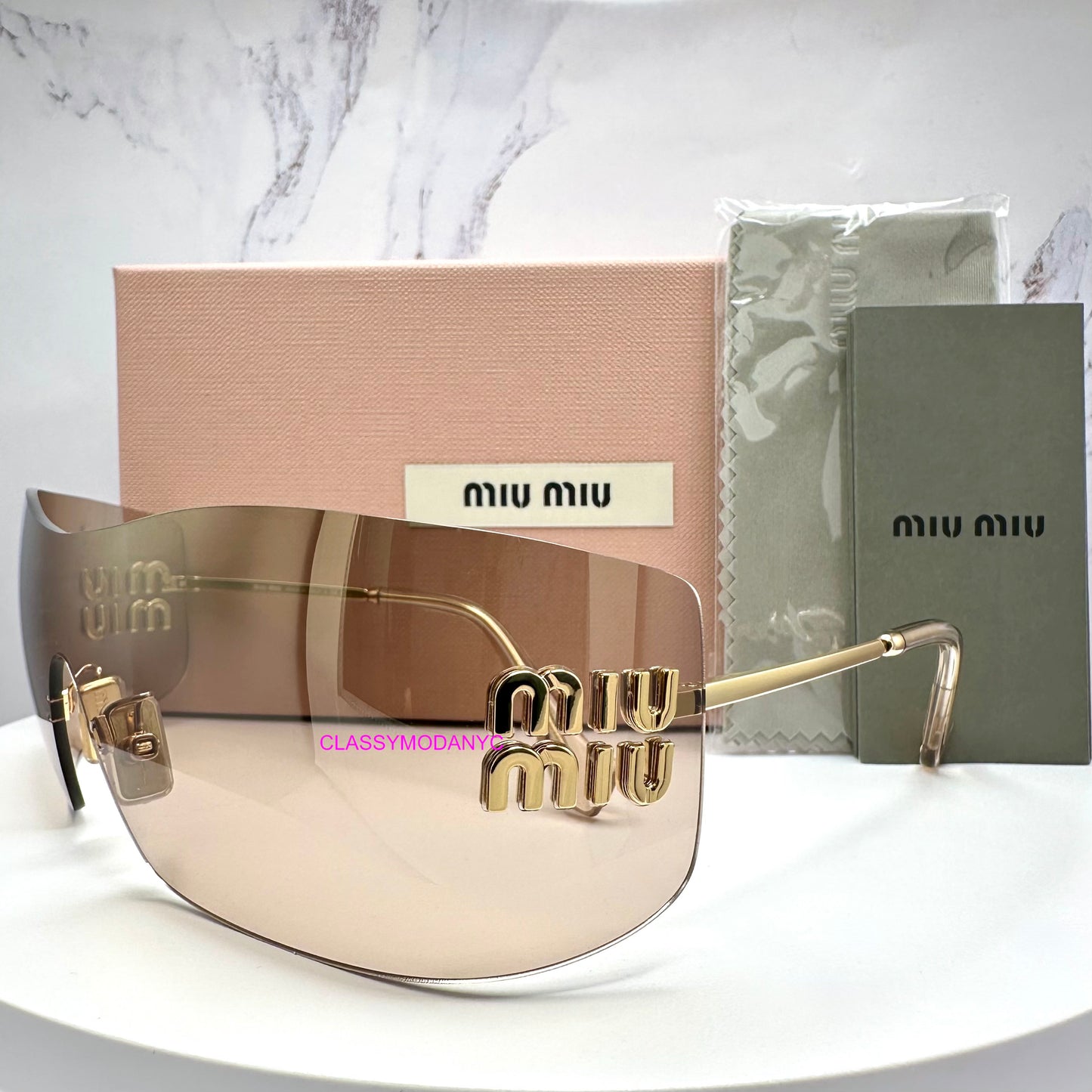 MUB53S 5AK20P MIU MIU sunglasses side view with case