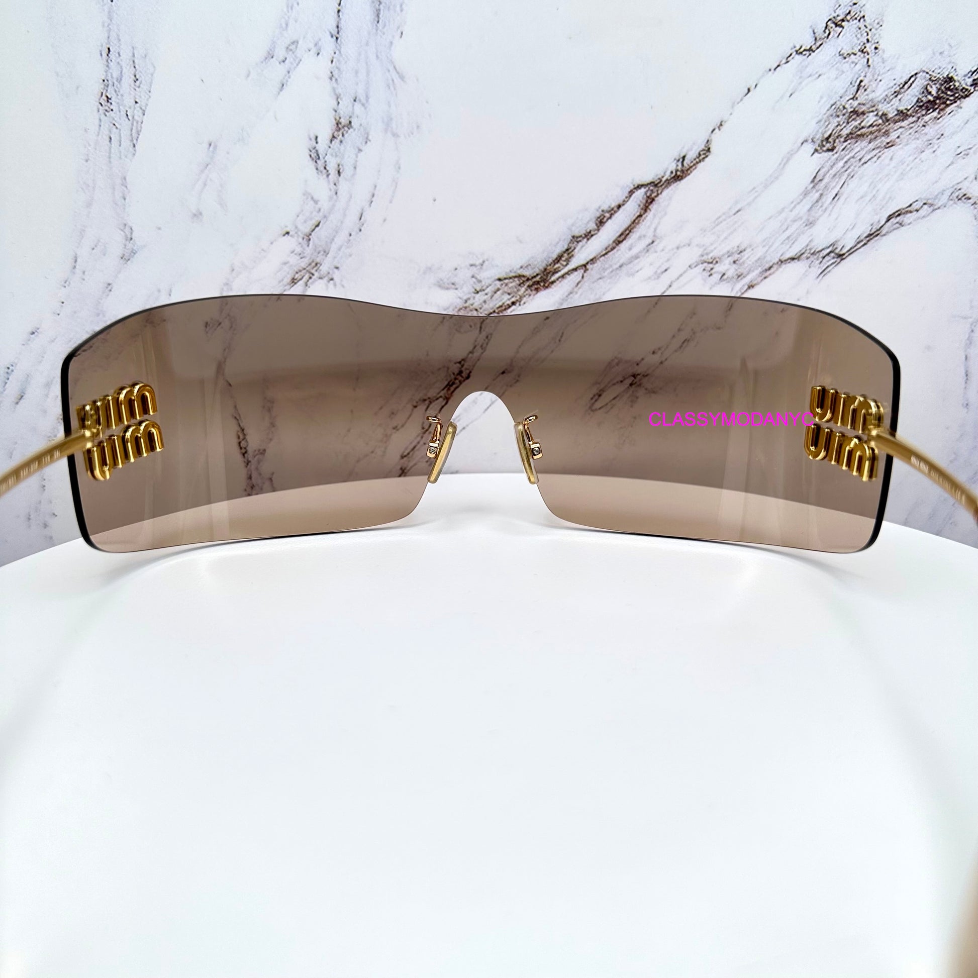 MUB53S 5AK20P MIU MIU sunglasses side view with case rimless oversized back view 