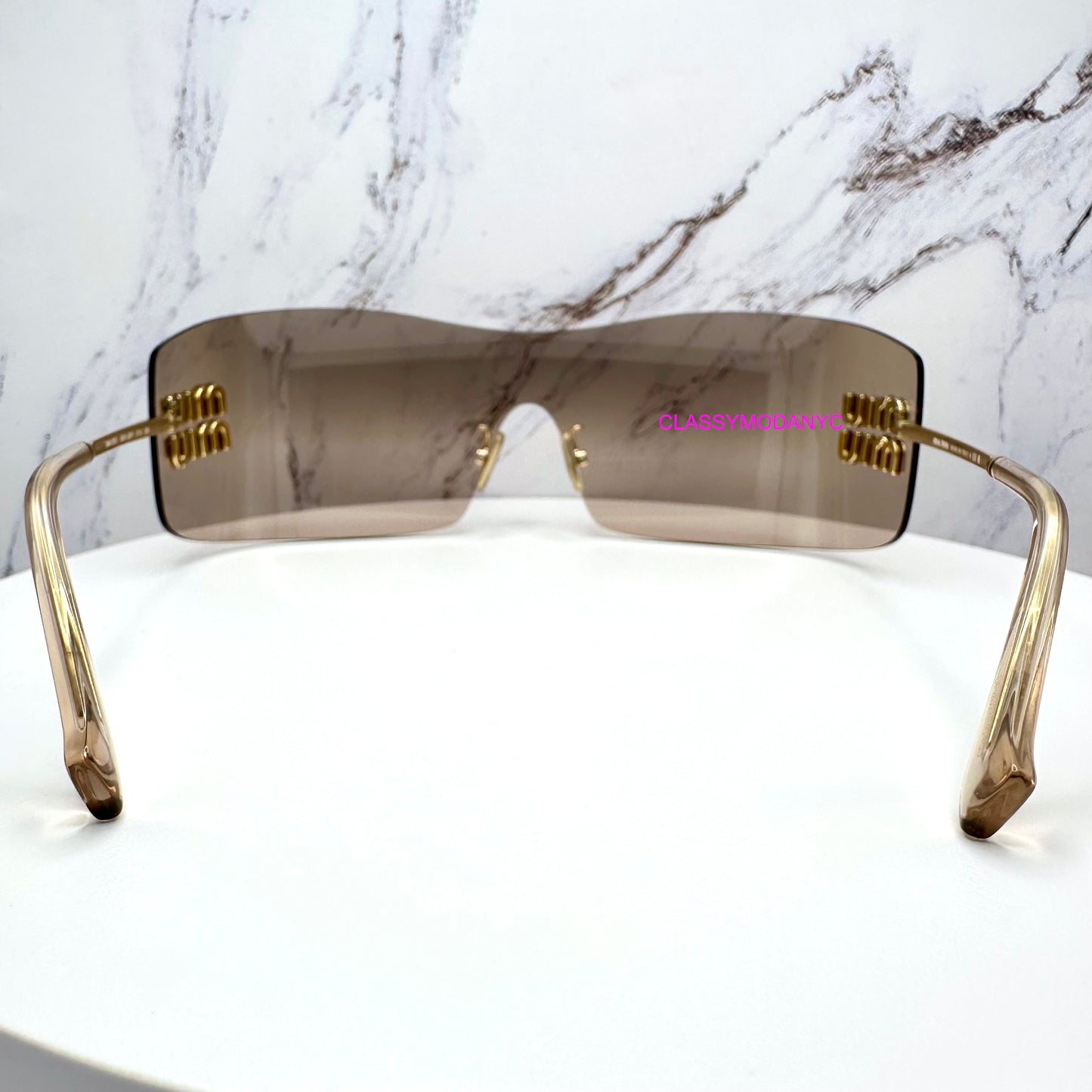 MUB53S 5AK20P MIU MIU sunglasses side view with case rimless oversized back view 