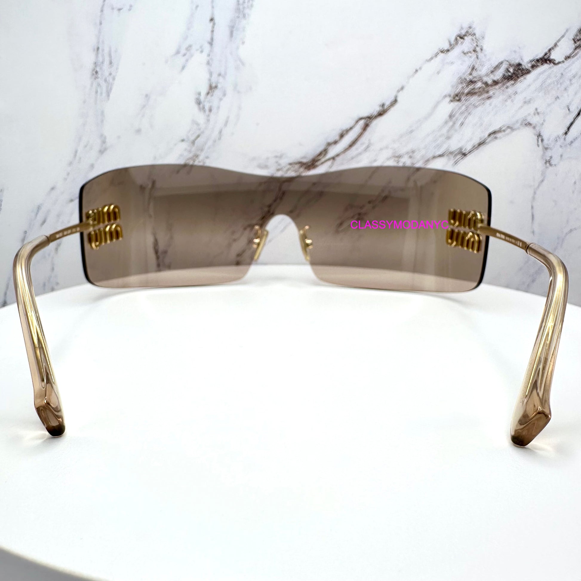 MUB53S 5AK20P MIU MIU sunglasses side view with case rimless oversized back view 